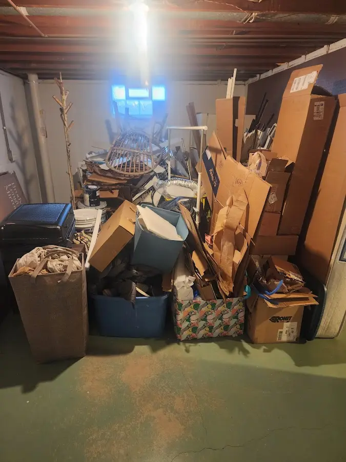 Roll-off dumpster container at job site for 20 Yard Dumpster Rental in Nixa